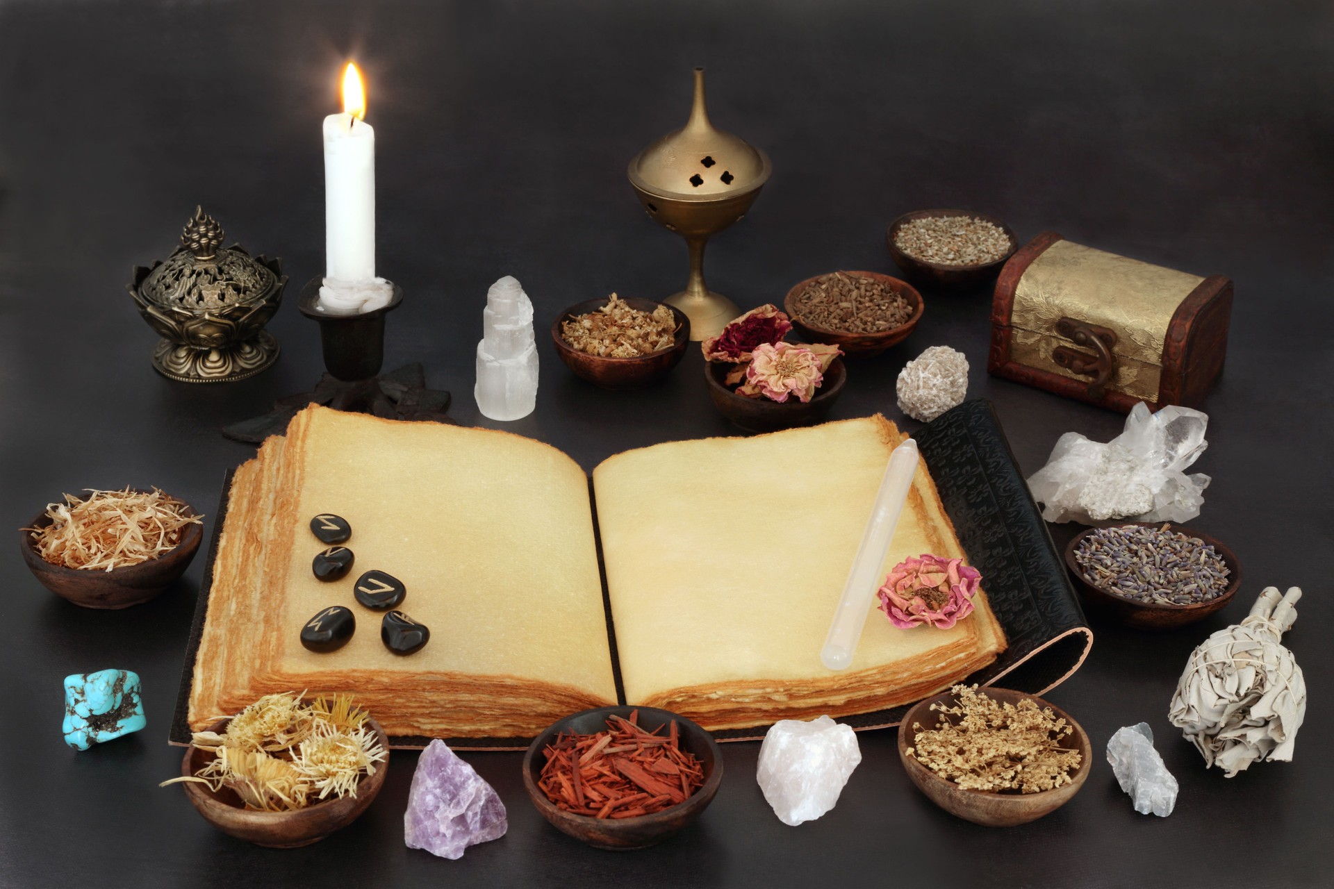 Witches Crystals Runes and Herbs with Book of Spells