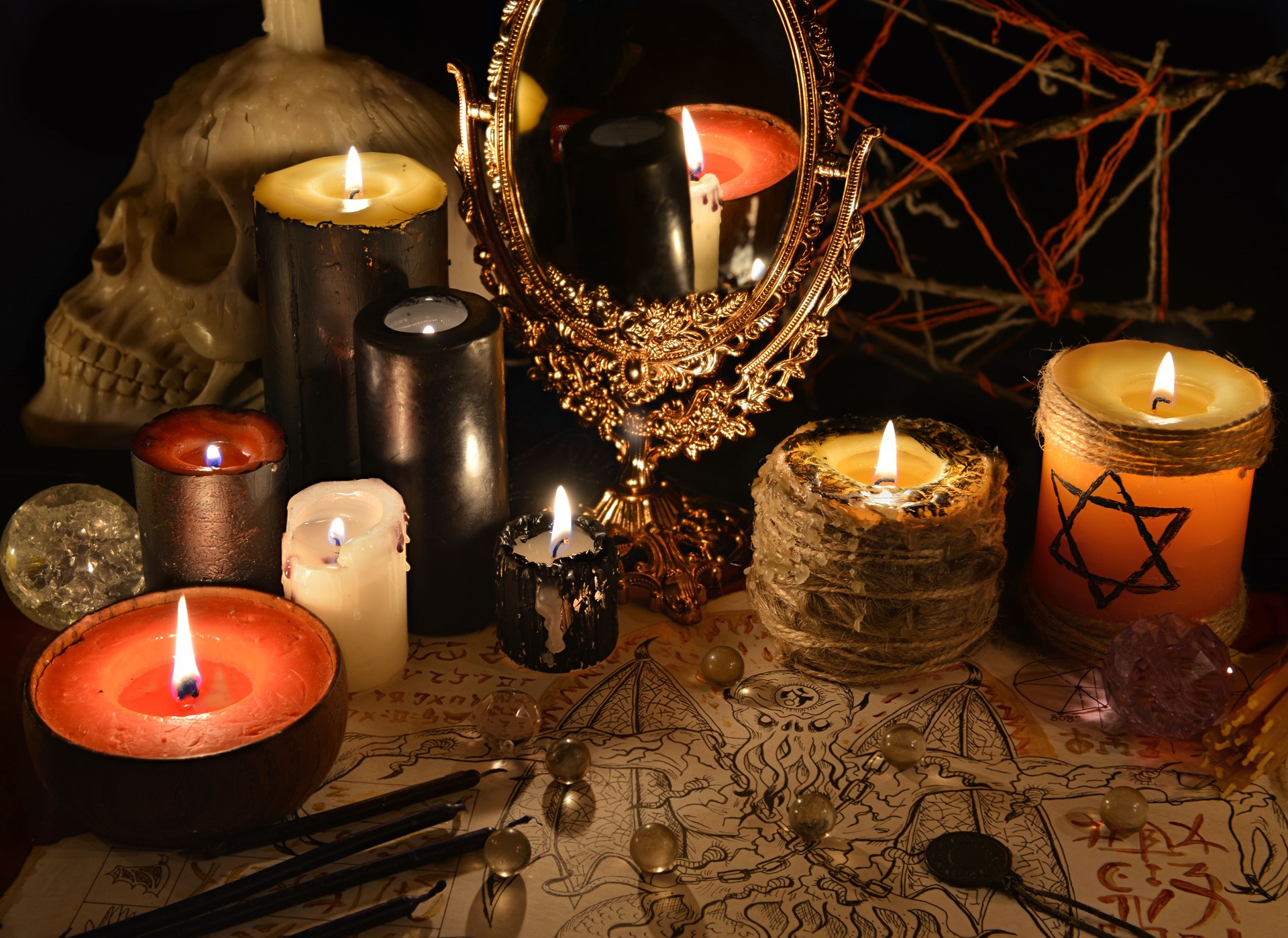 Mystic still life with magic mirror, demon paper and candles